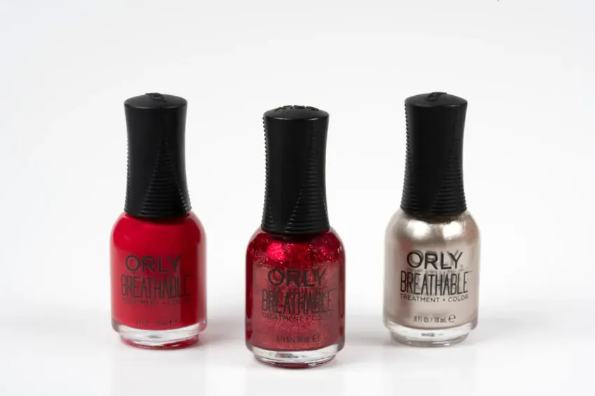 Colección de esmaltes ORLY Breathable en tonos rojo, glitter y nude sobre fondo blanco