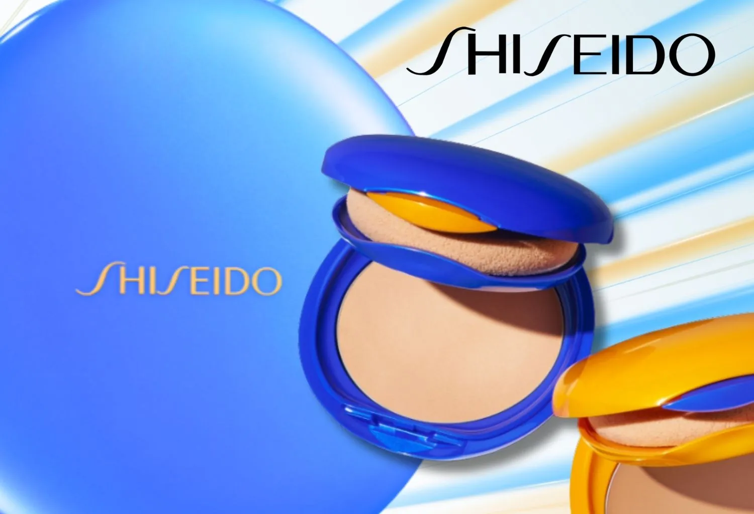 Polvos compactos Shiseido con esponja aplicadora en envase azul y amarillo