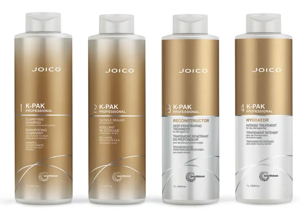 Productos del sistema K-PAK de Joico mostrando las cuatro fases del protocolo profesional de reconstrucción capilar: clarificar, sellar la cutícula, reconstruir e hidratar.