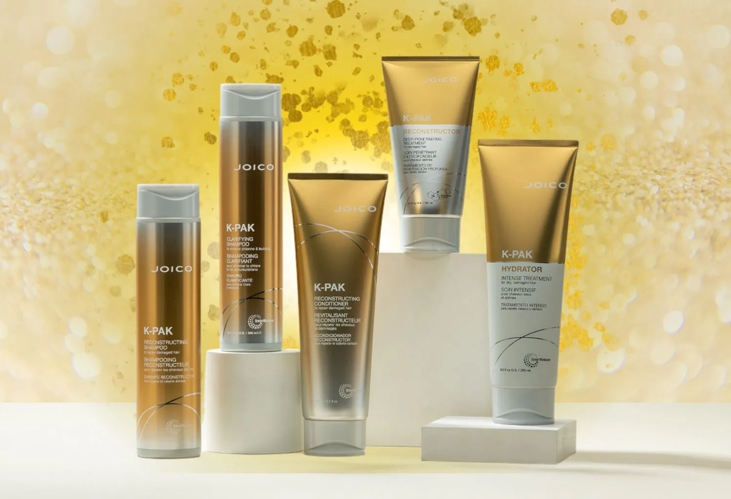 Productos Joico K-PAK con tecnología SmartRelease para reconstrucción capilar, reparación del cabello dañado e hidratación profunda de la fibra capilar.