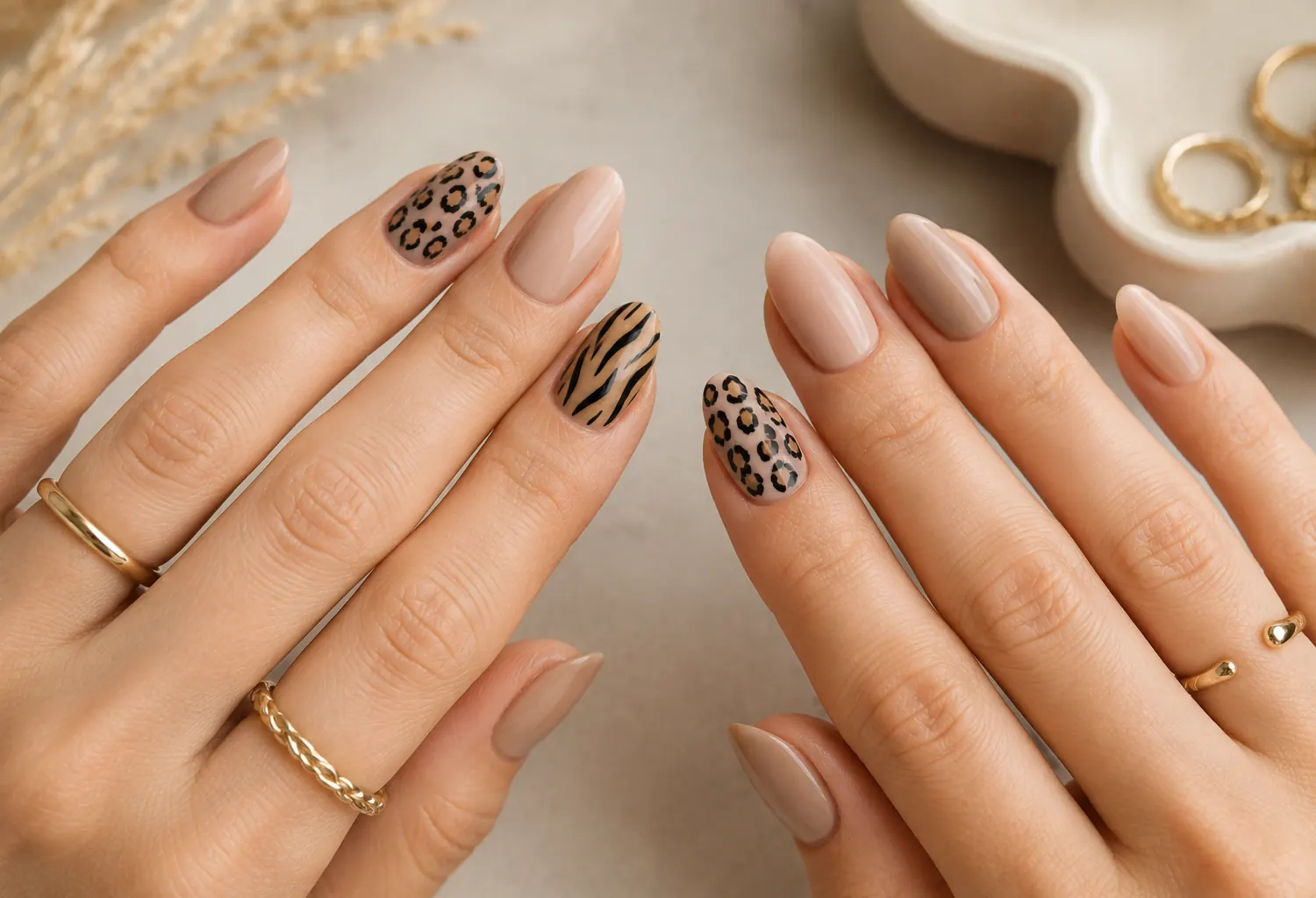 Manicura animal print elegante con uñas nude, leopardo y estampado de tigre