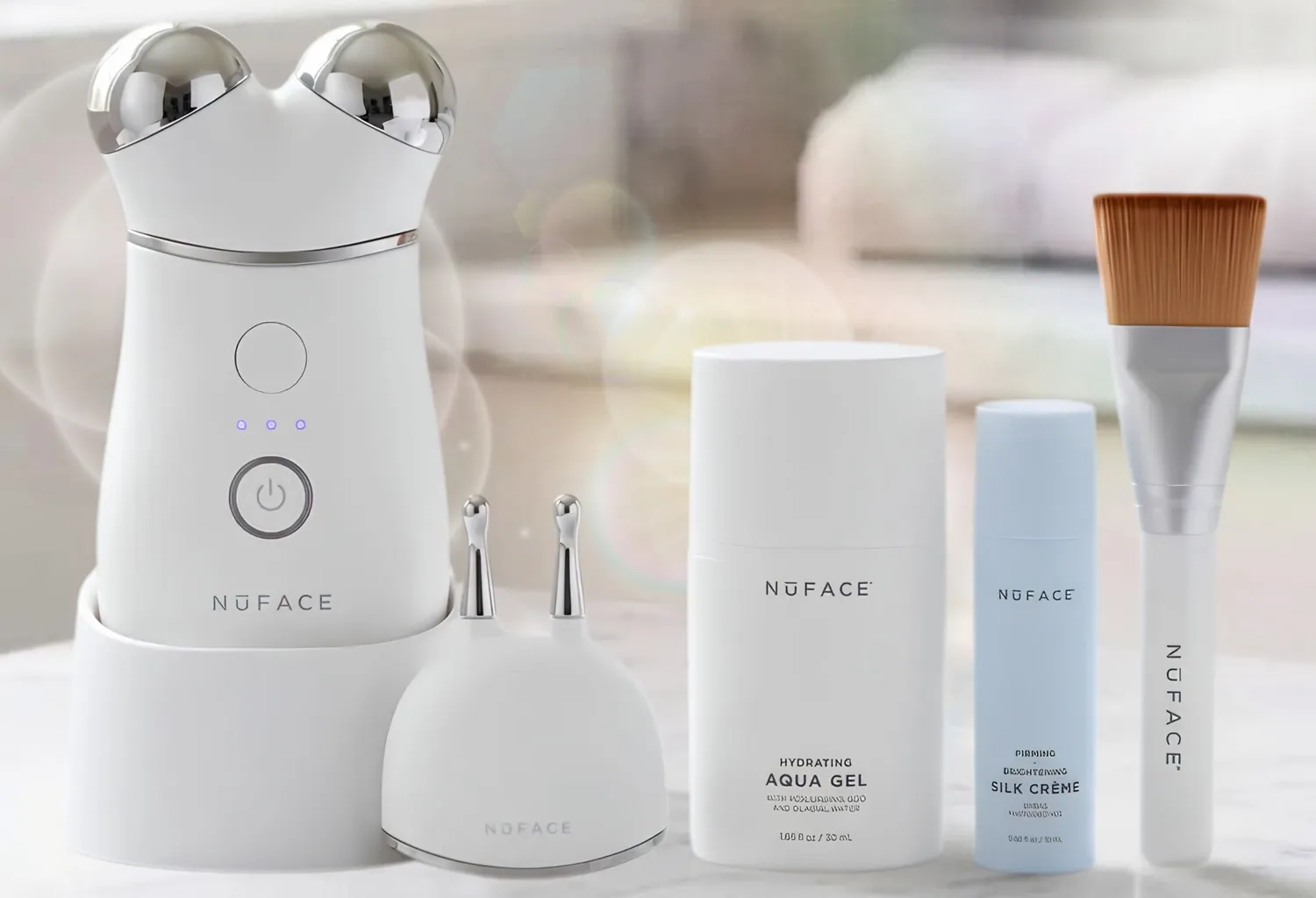 Dispositivo facial NuFACE con productos cosméticos y accesorios para tratamientos de microcorrientes