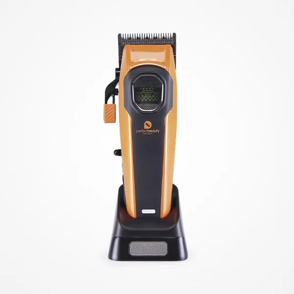 Máquina Orbis Beam Clipper naranja y negra en su base de carga